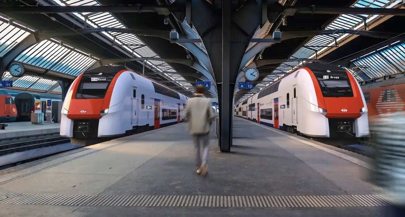 Suisse : Feu vert pour la commande de rames automotrices Siemens par les CFF 1 Impression d’artiste de deux rames automotrices Siemens pour les CFF en gare de Zurich HB (15 novembre 2025). Crédit photo : Siemens Mobility